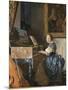 A Young Woman Seated at a Virginal-Johannes Vermeer-Mounted Art Print