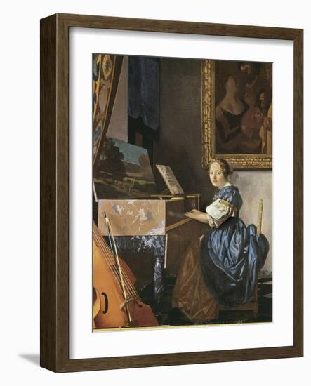 A Young Woman Seated at a Virginal-Johannes Vermeer-Framed Art Print