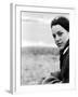 A Young Woman Sitting Near the Sea Wearing a Thick Jumper-RedHeadPictures-Framed Photographic Print