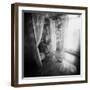 A Young Woman Smoking a Cigarette Seated in the Sunlight Shining through a Window-Rafal Bednarz-Framed Photographic Print