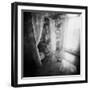 A Young Woman Smoking a Cigarette Seated in the Sunlight Shining through a Window-Rafal Bednarz-Framed Photographic Print