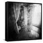 A Young Woman Smoking a Cigarette Seated in the Sunlight Shining through a Window-Rafal Bednarz-Framed Stretched Canvas