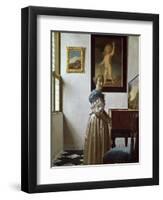 A Young Woman Standing at a Virginal. C.1670-Johannes Vermeer-Framed Premium Giclee Print