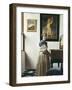 A Young Woman Standing at a Virginal-Johannes Vermeer-Framed Art Print