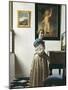 A Young Woman Standing at a Virginal-Johannes Vermeer-Mounted Art Print