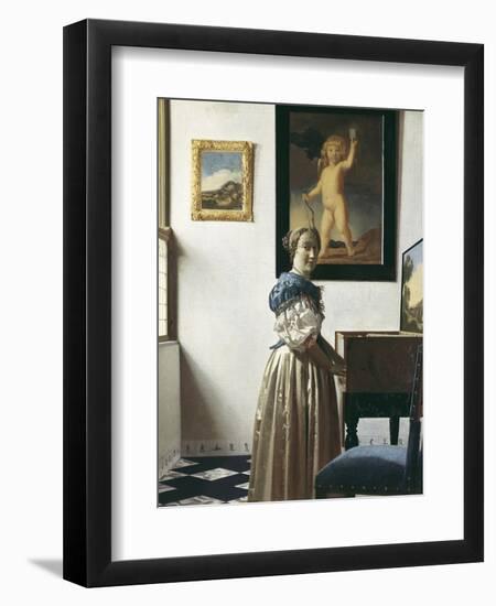 A Young Woman Standing at a Virginal-Johannes Vermeer-Framed Art Print