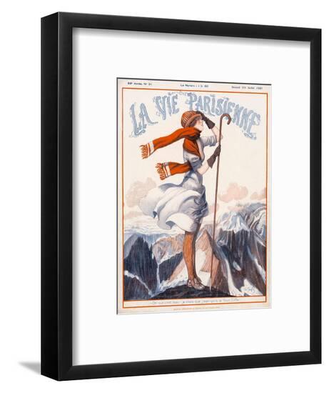 A Young Woman Stands on a Summit Amid a Mountain Range--Framed Art Print