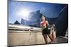 A Young Woman Stretches at the Walt Disney Concert Hall in Downtown Los Angeles, California-Carlo Acenas-Mounted Photographic Print