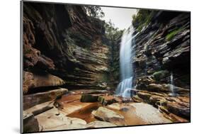 A Young Woman Stretches under Cachoeira Mosquito in Chapada Diamantina National Park-Alex Saberi-Mounted Photographic Print