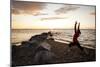 A Young Woman Welcomes the Sun by Practicing Yoga at Ausable Beach, Lake Champlain, New York-Louis Arevalo-Mounted Photographic Print