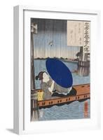 A Young Woman with a Blue Open Umbrella in a Boat Between Wooden Supports-Kuniyoshi Utagawa-Framed Giclee Print