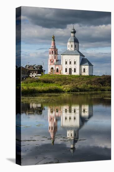 Abandonded Church Reflecting in the Kamenka River in the UNESCO World Heritage Site-Michael Runkel-Stretched Canvas