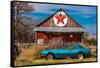 Abandoned blue Camaro Chevrolete in front of deserted Texaco Station, remote part of Nebraska-null-Framed Stretched Canvas