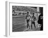 Abebe Bikila and Mamo Wolde in Exhibition Race at Berlin Olympic Stadium-null-Framed Premium Photographic Print