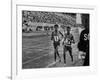 Abebe Bikila and Mamo Wolde in Exhibition Race at Berlin Olympic Stadium-null-Framed Premium Photographic Print