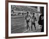 Abebe Bikila and Mamo Wolde in Exhibition Race at Berlin Olympic Stadium-null-Framed Premium Photographic Print