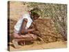 Aborigine Woman Digging for Wichetty Grubs, Northern Territory, Australia-Claire Leimbach-Stretched Canvas