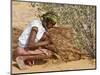 Aborigine Woman Digging for Wichetty Grubs, Northern Territory, Australia-Claire Leimbach-Mounted Photographic Print