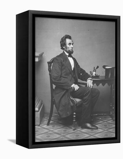 Abraham Lincoln, full-length portrait, seated, 1861-Alexander Gardner-Framed Stretched Canvas