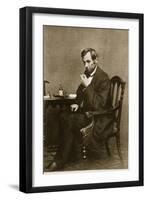 Abraham Lincoln Sitting at Desk, 1861-Mathew Brady-Framed Giclee Print