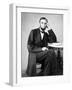 Abraham Lincoln, the 16th US President, leaning against a book while sitting at a table.-Vernon Lewis Gallery-Framed Photographic Print