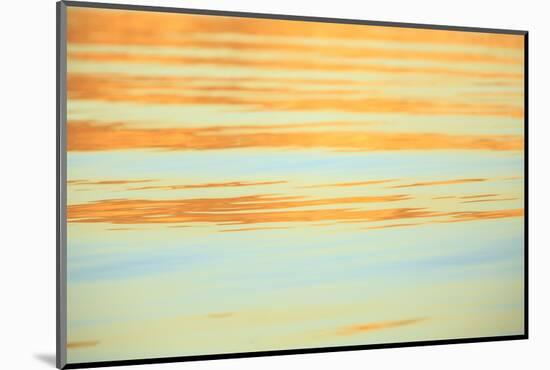 Abstract of water ripples in orange and blue.-Stuart Westmorland-Mounted Photographic Print