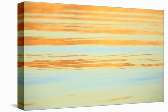 Abstract of water ripples in orange and blue.-Stuart Westmorland-Stretched Canvas
