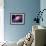 Accretion by a Supermassive Black Hole-null-Framed Premium Photographic Print displayed on a wall