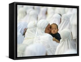 Acehnese Woman Holds a Child after Eid Al-Adha Prayer in the Tsunami-Ravaged Town of Meulaboh-null-Framed Stretched Canvas