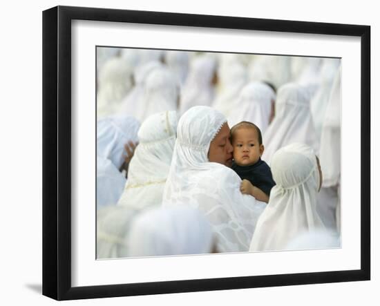 Acehnese Woman Holds a Child after Eid Al-Adha Prayer in the Tsunami-Ravaged Town of Meulaboh-null-Framed Premium Photographic Print