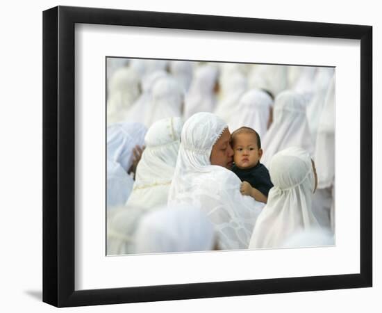 Acehnese Woman Holds a Child after Eid Al-Adha Prayer in the Tsunami-Ravaged Town of Meulaboh-null-Framed Photographic Print