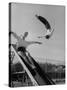 Acrobat and Actor Russ Tamblyn Doing a Flip at a Playground with Movie Actress Venetia Stevenson-Allan Grant-Stretched Canvas