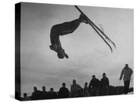 Acrobatic Skier Jack Reddish in Somersault at Sun Valley Ski Resort-J^ R^ Eyerman-Stretched Canvas