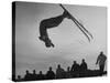 Acrobatic Skier Jack Reddish in Somersault at Sun Valley Ski Resort-J^ R^ Eyerman-Stretched Canvas