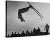 Acrobatic Skier Jack Reddish in Somersault at Sun Valley Ski Resort-J^ R^ Eyerman-Stretched Canvas