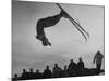 Acrobatic Skier Jack Reddish in Somersault at Sun Valley Ski Resort-J^ R^ Eyerman-Mounted Photographic Print