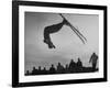 Acrobatic Skier Jack Reddish in Somersault at Sun Valley Ski Resort-J^ R^ Eyerman-Framed Photographic Print