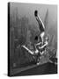 Acrobats Performing on the Empire State Building-null-Stretched Canvas