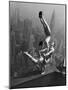 Acrobats Performing on the Empire State Building-null-Mounted Photographic Print
