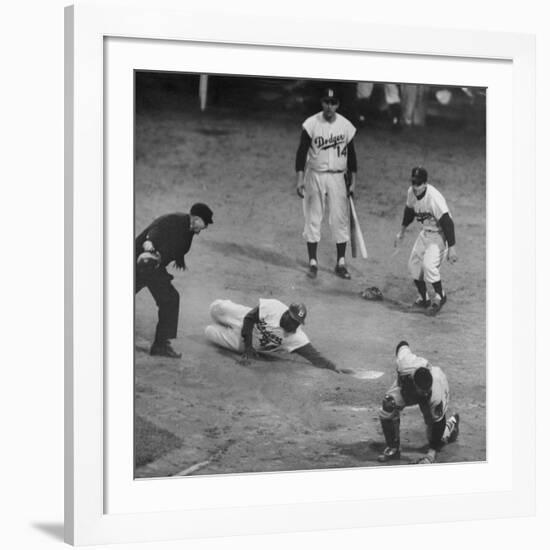 Action During a Game Between the Brooklyn Dodgers and the Milwaukee Braves at Ebbet's Field-Ralph Morse-Framed Premium Photographic Print