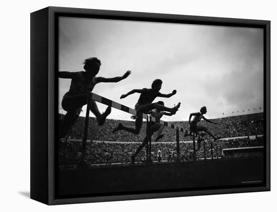 Action During the Women's 100m Hurdles at the 1952 Olympic Games in Helsinki-Mark Kauffman-Framed Stretched Canvas