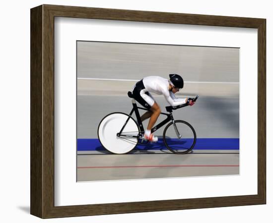 Action of Female Cyclist Competing on the Velodrome-null-Framed Photographic Print