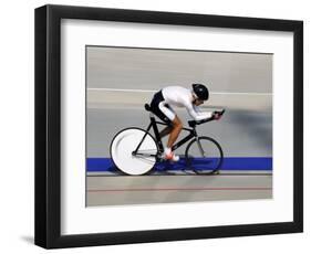 Action of Female Cyclist Competing on the Velodrome-null-Framed Photographic Print