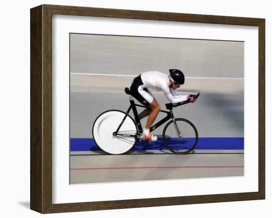 Action of Female Cyclist Competing on the Velodrome-null-Framed Photographic Print