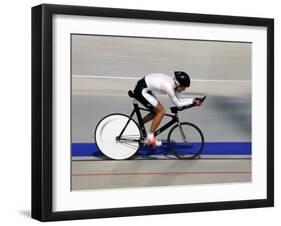 Action of Female Cyclist Competing on the Velodrome-null-Framed Photographic Print