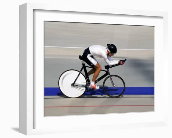 Action of Female Cyclist Competing on the Velodrome-null-Framed Photographic Print