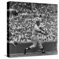 Action Shot of Chicago Cub's Ernie Banks Smacking the Pitched Baseball-John Dominis-Stretched Canvas