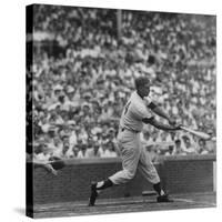 Action Shot of Chicago Cub's Ernie Banks Smacking the Pitched Baseball-John Dominis-Stretched Canvas