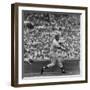 Action Shot of Chicago Cub's Ernie Banks Smacking the Pitched Baseball-John Dominis-Framed Premium Photographic Print