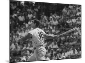 Action Shot of Cincinatti Red's Ted Kluszewski, Following the Direction of Baseball from His Hit-John Dominis-Mounted Premium Photographic Print